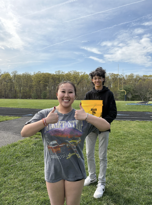 Seanna Herr ('26) and Ian Abizaid ('26) prepare for the Ice Bucket Challenge.